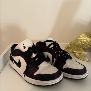 Black and white jordan 22 with red stitching